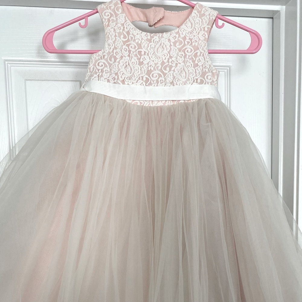 Girls 2T flower girls dress. The color is Whisper Pink